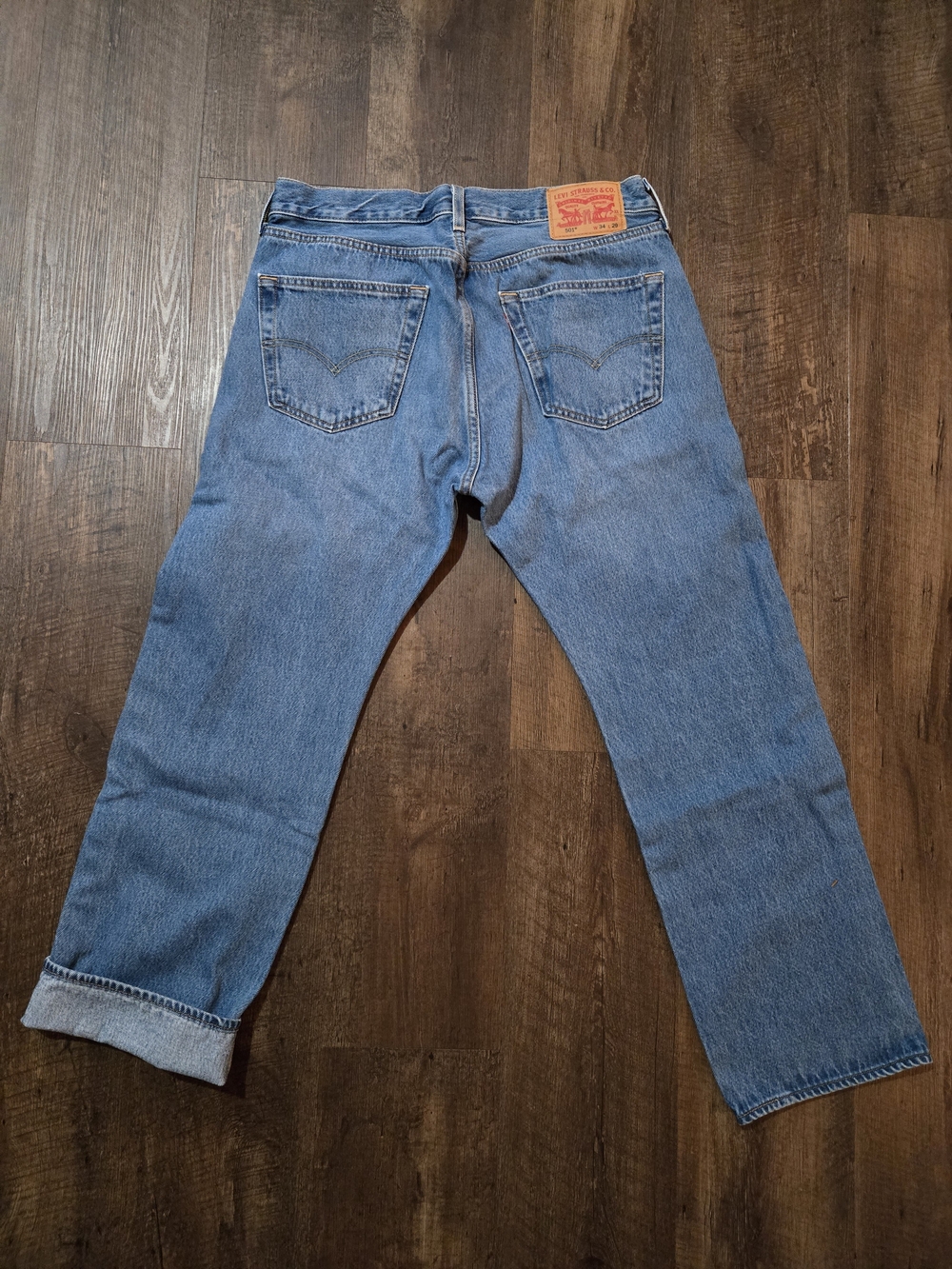 Levi's 501 Men's Straight Jeans - Medium Wash.